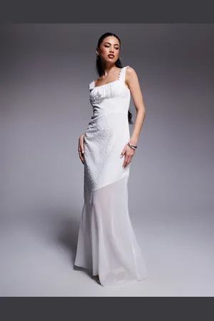 Kaiia Exclusive cotton broderie tie bust detail asymmetric sheer hem maxi dress in