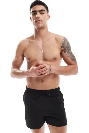 Pull&Bear Textured swim shorts with pocket in