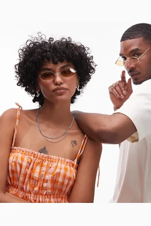 Le Specs Love Train slim oval sunglasses in vintage tort with amber lens