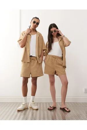 Reclaimed Unisex cord shorts in brown-Neutral