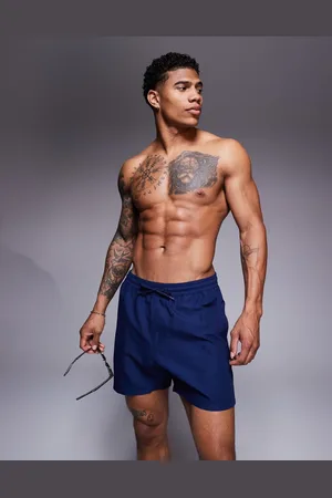 ASOS Swim shorts in mid length in