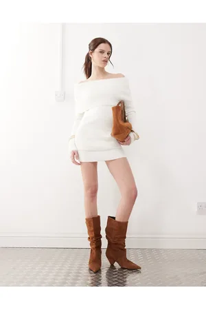 The Kript Off shoulder mini dress with faux fur cuffs and fold over in
