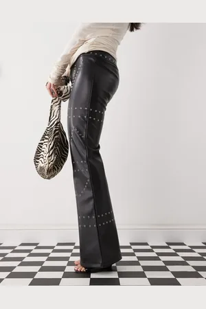 The Kript Low rise leather pants with studs in