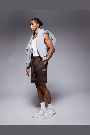 The Couture Club Varsity mesh shorts in dark