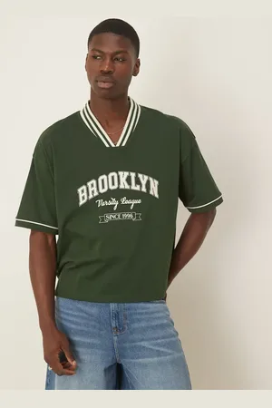 ASOS Boxy oversized t-shirt with sport graphic in green