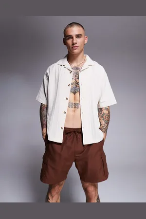 ASOS Swim shorts in mid length with cargo pockets in