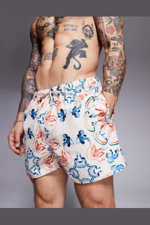 ASOS Swim shorts in short length with watercolour tile print in -Neutral