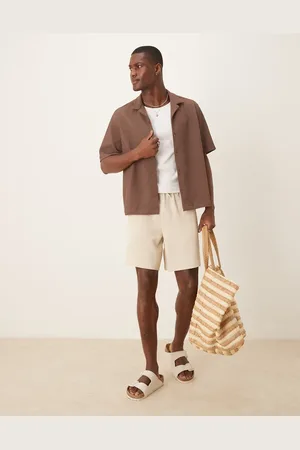 ASOS Mid length waffle shorts in -White