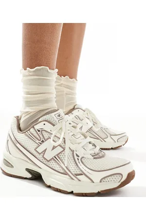 New Balance 740 sneakers in and brown Exclusive to ASOS-Neutral
