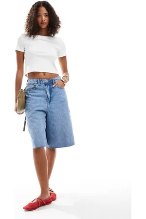 Pieces® Longline straight leg jorts in denim wash