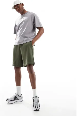 ASOS Essential mid length oversized shorts in dark green