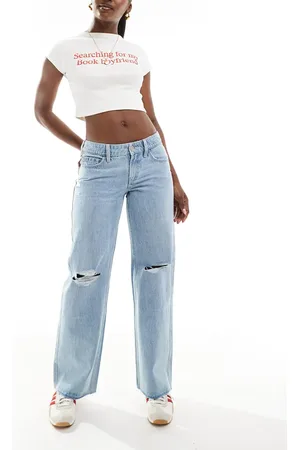 Hollister Low rise baggy raw hem jeans in -Blue