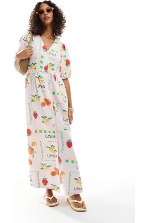 Pieces® Puff sleeve button front maxi dress in pale pink based fruit print