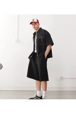 COLLUSION Relaxed skater jersey trackie shorts in