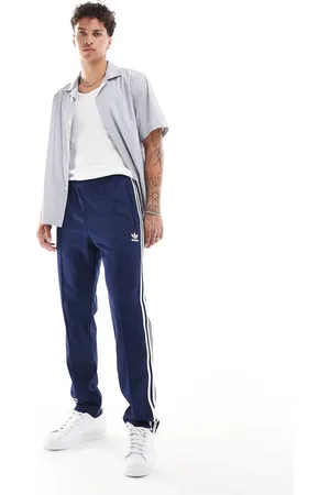 adidas Classics tracksuit bottoms in indigo-Navy