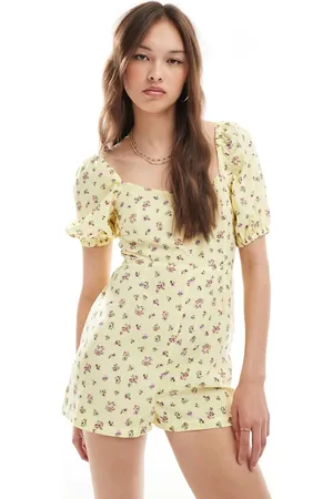 New Look Tie back playsuit in yellow ditsy floral