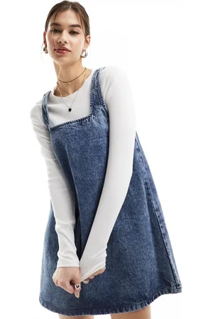 Monki Mini denim dungaree dress in soft acid wash