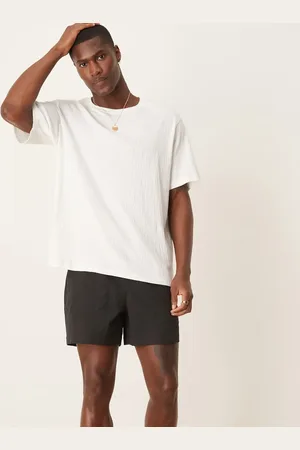 ASOS Shorter length striped shorts in black-Navy