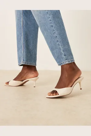 ASOS Hush leather mid heeled mules in off white-Yellow