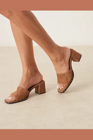 ASOS Hallie premium suede mid heeled mules in camel-Brown