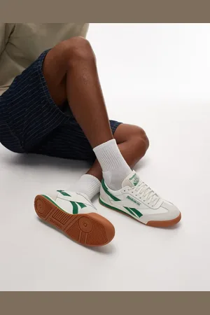 Reebok Campio sneakers in off white and green