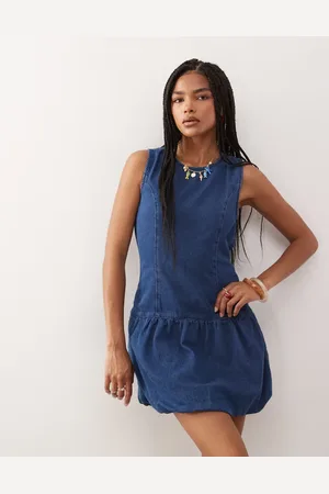 Reclaimed Sleeveless denim puffball mini dress in -Blue