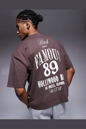 ASOS Boxy t-shirt with grunge sports graphic in brown