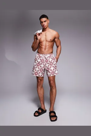 ASOS Swim shorts in mid length with geo print in -Neutral