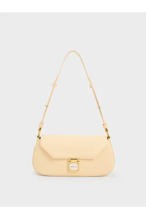 Charles & Keith Oona Canvas Curved Shoulder Bag in White