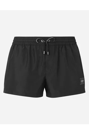 Dolce & Gabbana Beachwear - Short swim trunks with branded plate