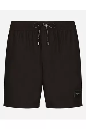 Dolce & Gabbana Beachwear - Mid-length swim trunks with branded plate