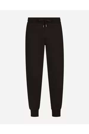 Dolce & Gabbana Trousers and Shorts - Jersey jogging pants with branded plate