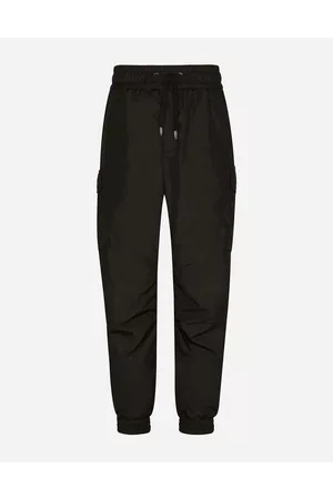 Dolce & Gabbana Trousers and Shorts - Nylon cargo pants with logo tag