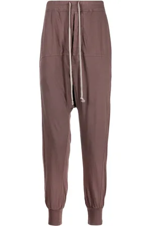 Joggers & track pants in the color Purple for men