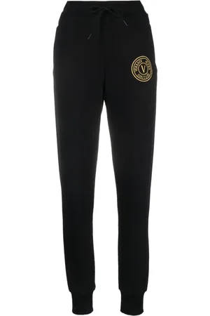 Versace Allover flared wool pants in pink - Versace