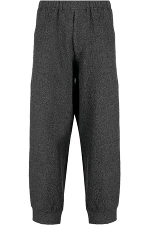 YOHJI YAMAMOTO Crinkled mélange-effect trousers