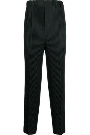 Issey Miyake Pliss??-effect tapered trousers