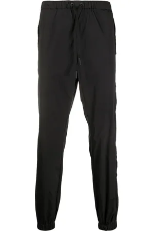 MARCELO BURLON Cross tapered track pants