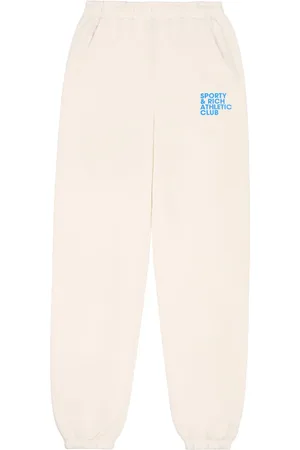 Sporty & Rich Slogan-print cotton track pants