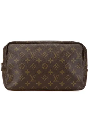 LOUIS VUITTON 2000-2024 Monogram Trousse Toilette 28 clutch bag