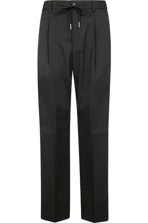 TAGLIATORE Pleat-detailing trousers
