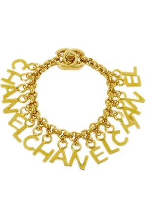 CHANEL 1996 Turnlock letter charms bracelet