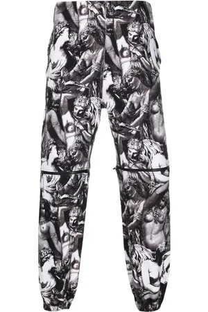UNDERCOVER Graphic-print track pants