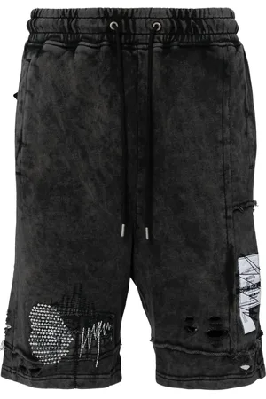Musium Div. Distressed cotton track shorts
