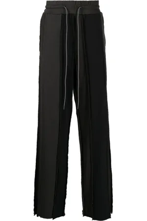 MOSTLY HEARD RARELY SEEN Panelled cotton track pants