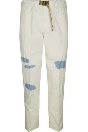 White Sand Ripped-detail trousers