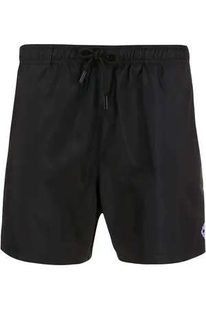 MARCELO BURLON Embroidered logo swim shorts
