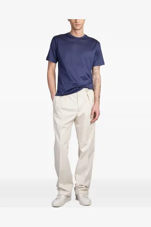 TAGLIATORE Pleated trousers