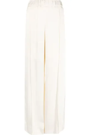 Jil Sander Pressed-crease elasticated-waist flared trousers