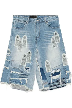 Who Decides War Arch blowout denim shorts